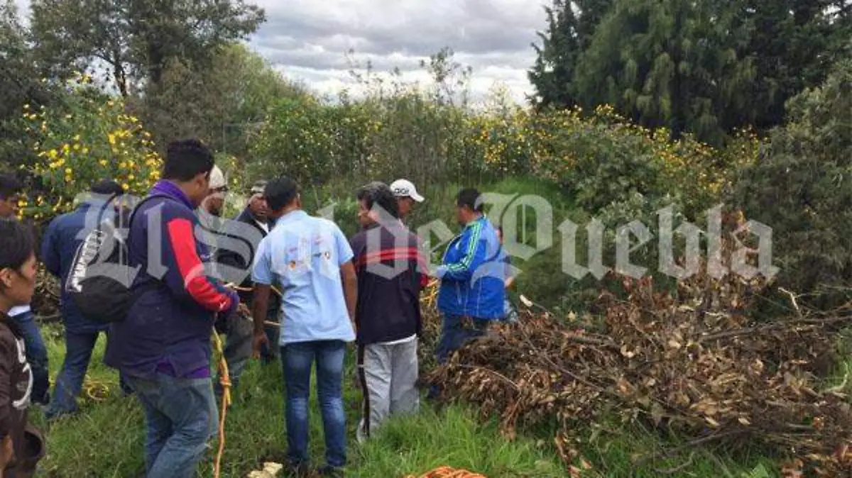 encuentran a joven en barranca